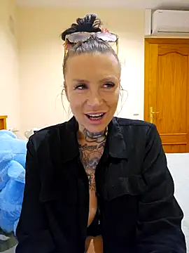 TattooMilfTanja naked strip on webcam for live sex chat